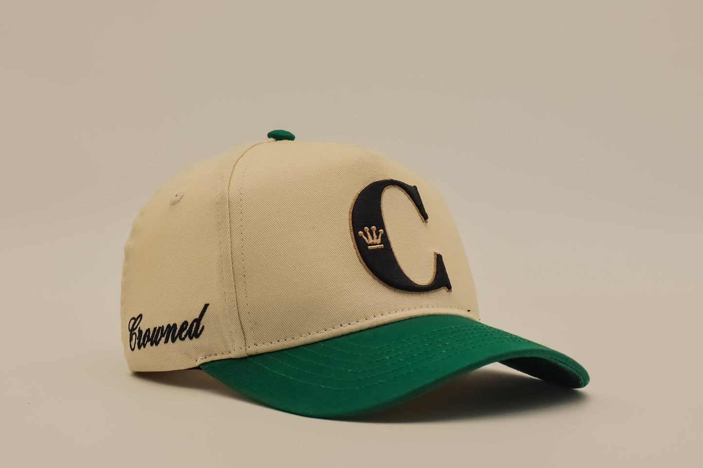 Crowned emerald green cap