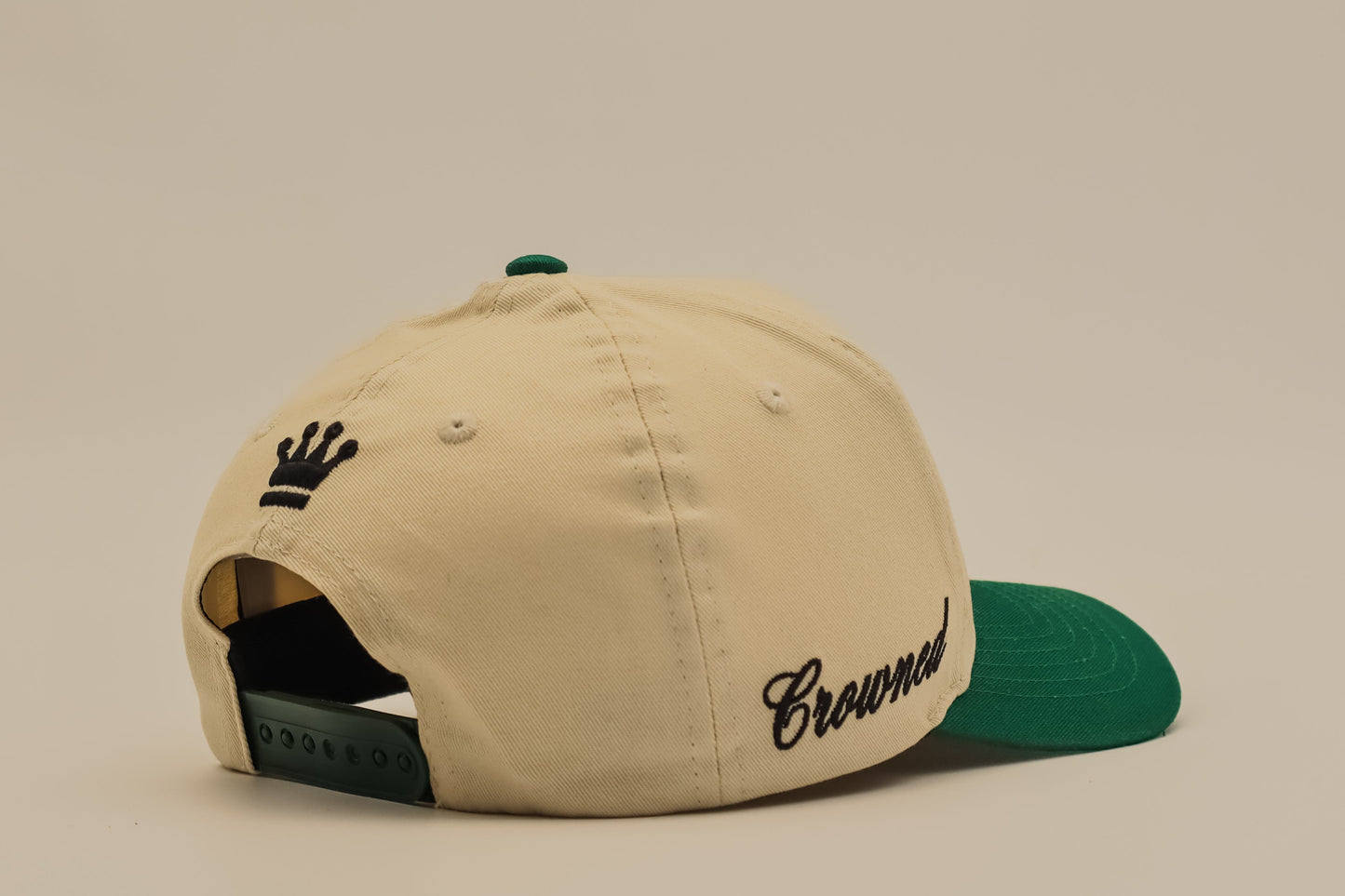 Crowned emerald green cap