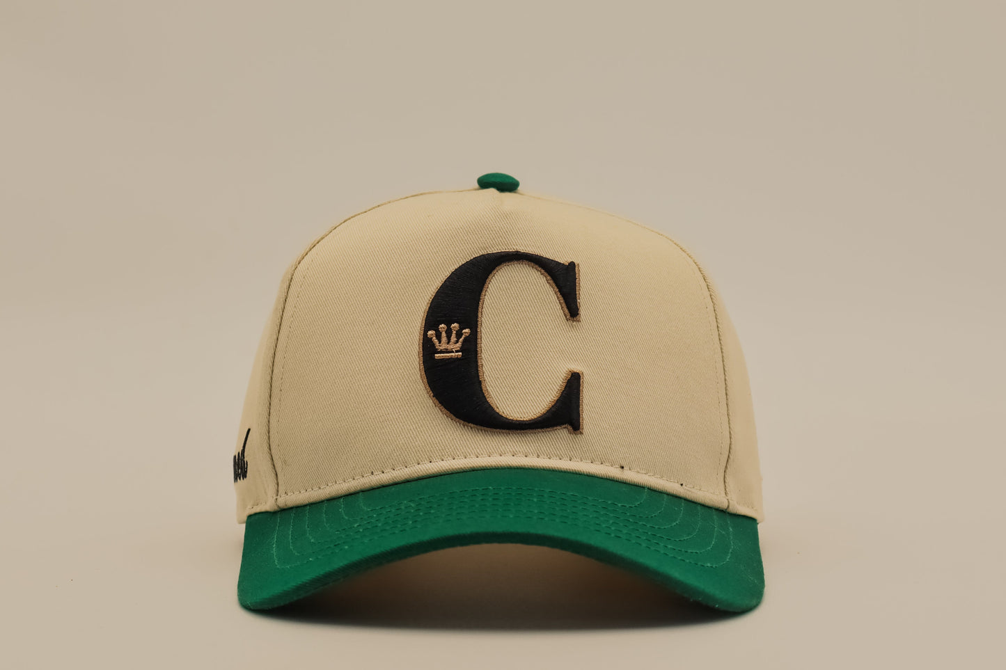Crowned emerald green cap